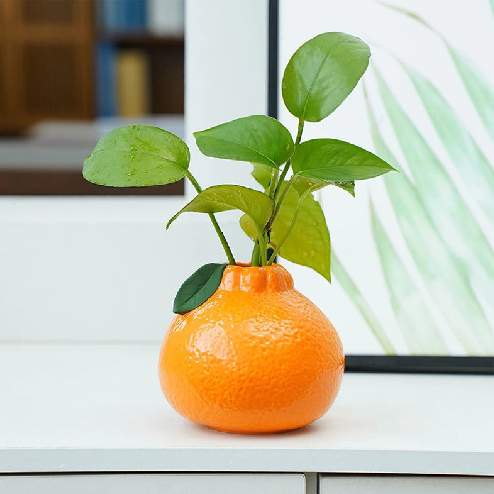 Moderne keramisk orange vase til boligindretning